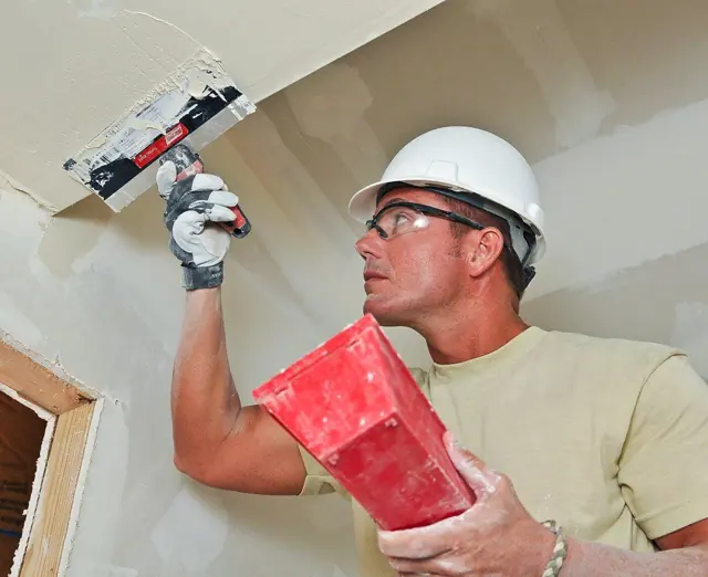 Applying joint compound to drywall