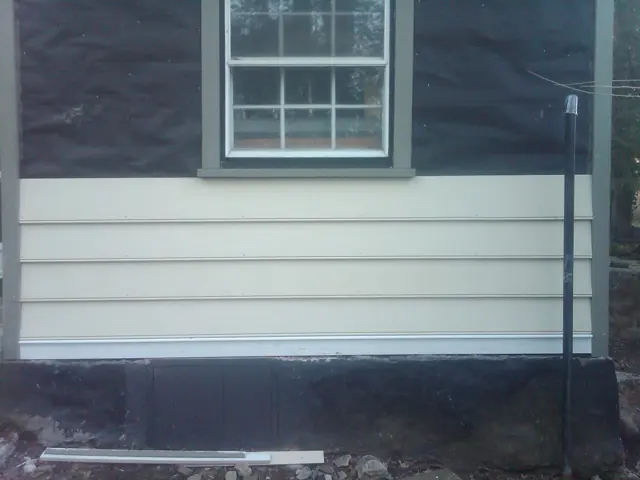 New lap siding on a house wall