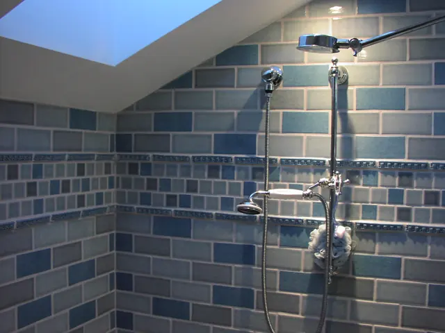 Tiled shower with blue tile